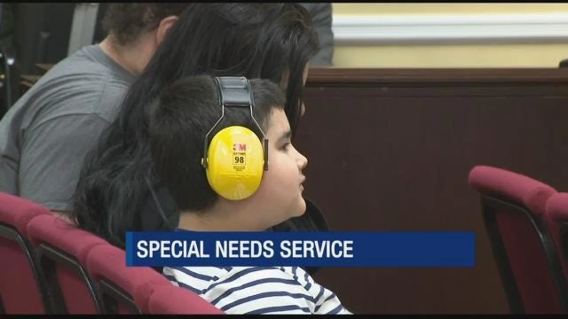 People with special needs take part in Restoration Christian Ministries service