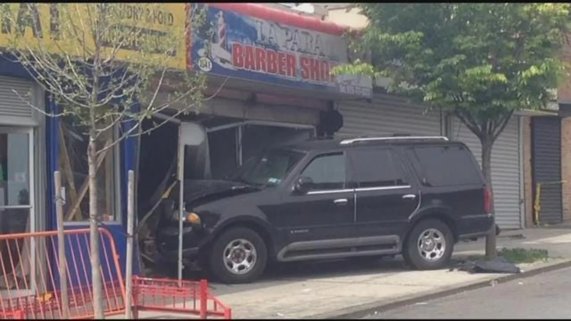 SUV crashes into Claremont barbershop