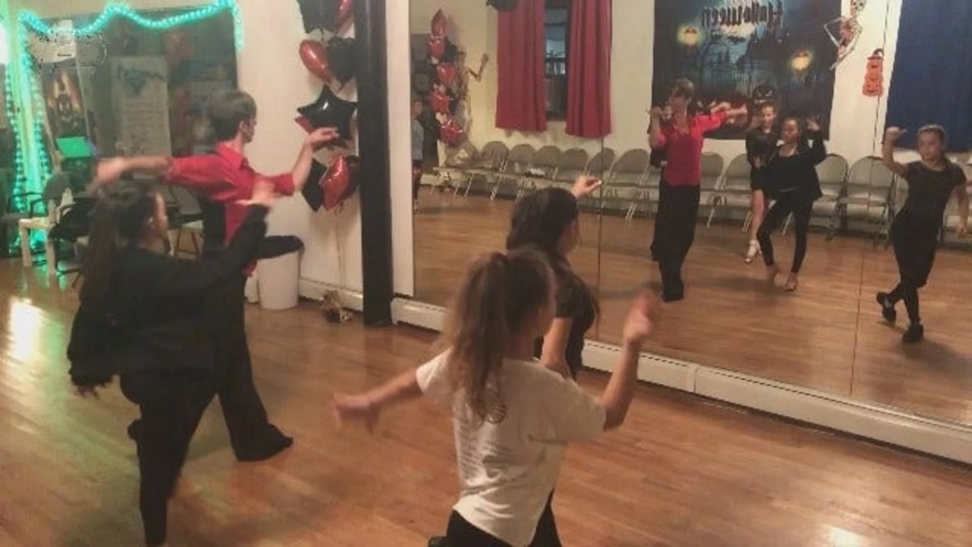 Ballroom instructor teaches next generation of dancers
