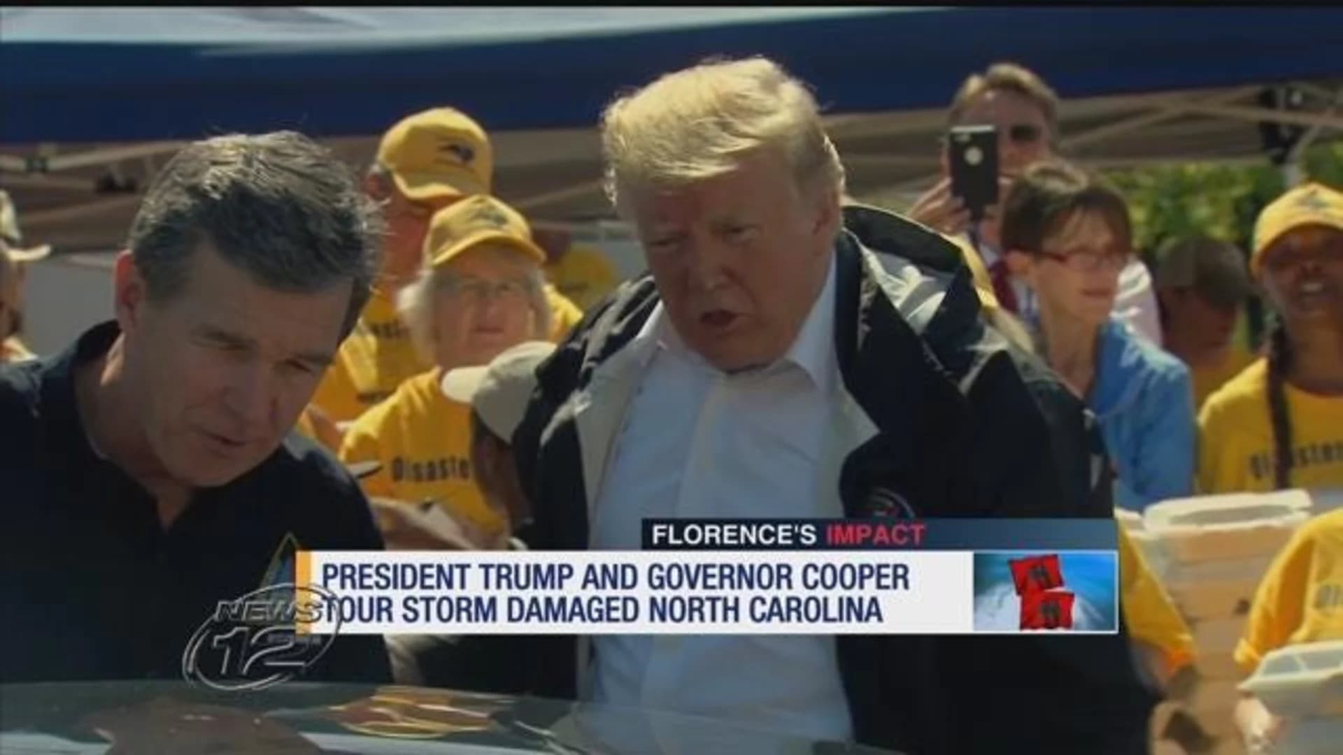 President Trump comforts storm-ravaged Carolinas with hot dogs, hugs