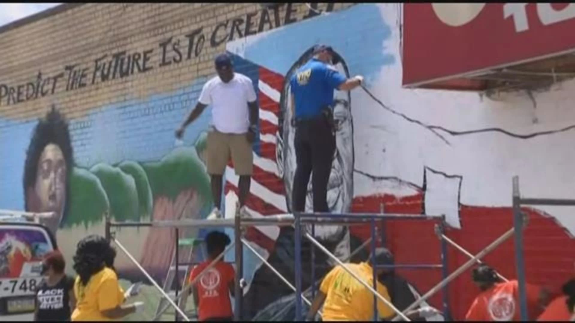 Local artist works with police on George Floyd mural in Canarsie