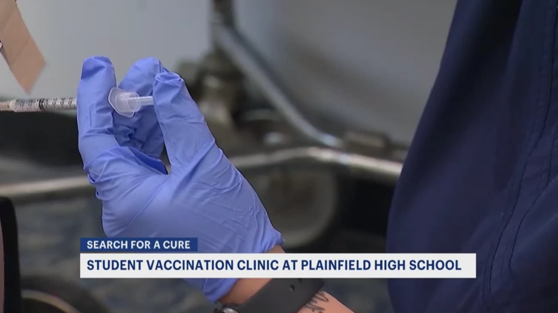 Young people roll up their sleeves at Plainfield High School COVID-19 vaccine clinic