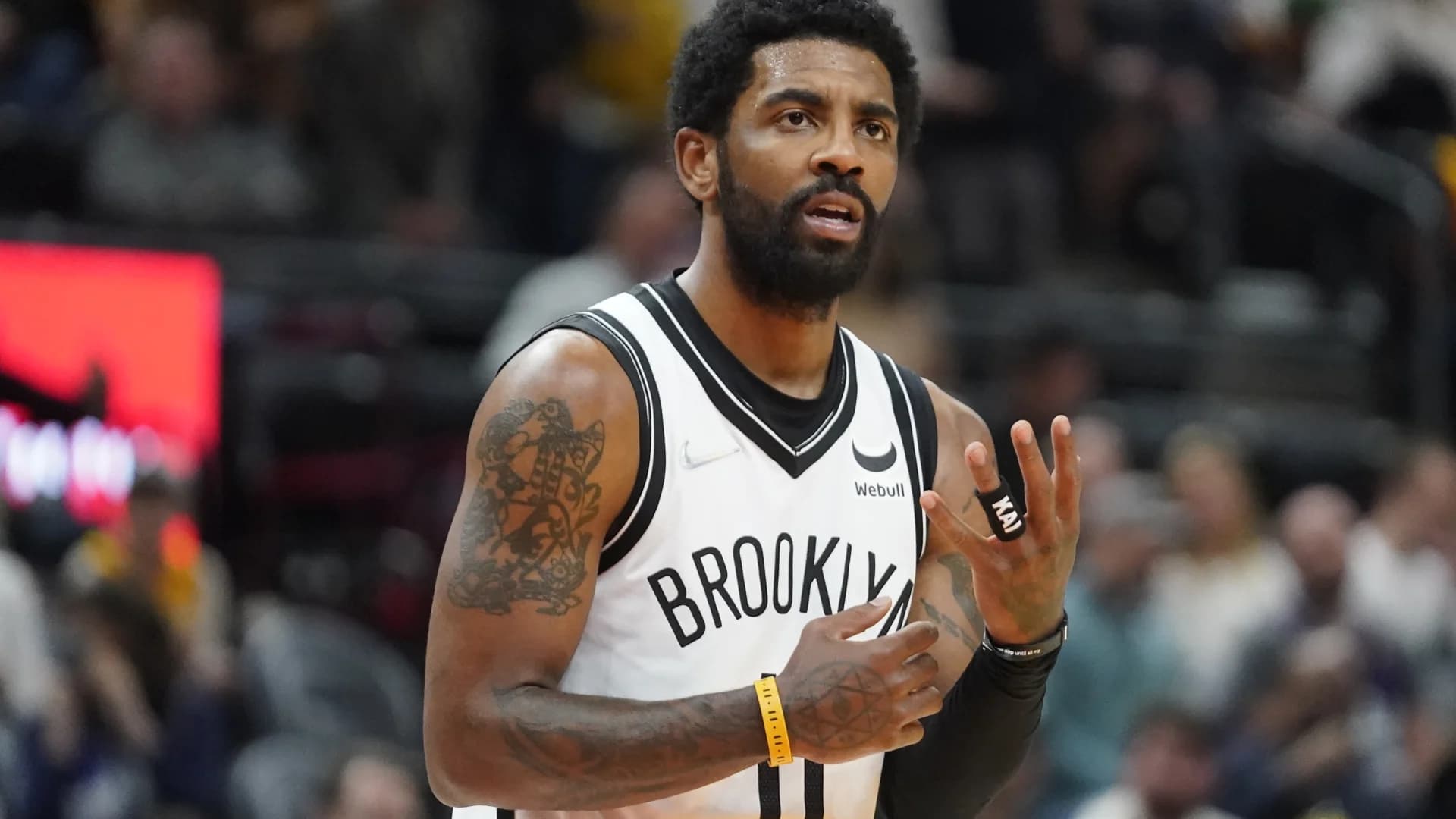 AP sources: Irving decides to exercise $37M option with Nets
