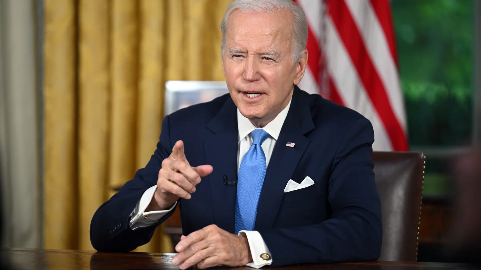 Biden signs debt ceiling bill that pulls US back from brink of unprecedented default