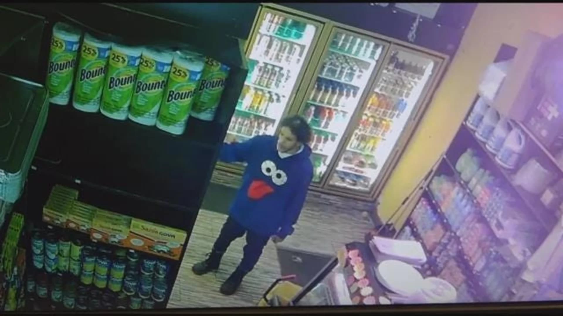 Caught on camera: Man in Cookie Monster hoodie steals bodega cat