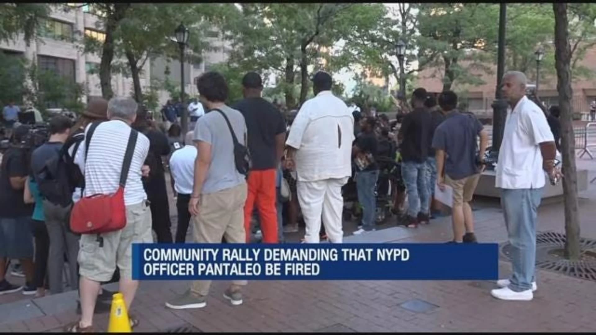 Rally at NYPD HQ demands officer in Eric Garner case be fired